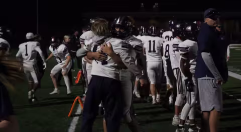 Mt.Spokane Football Player Hug