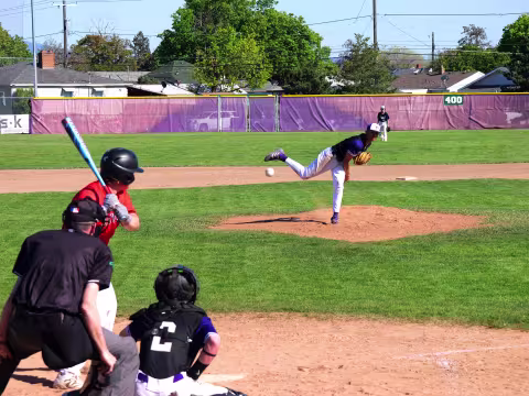 Rogers pitching to Clarkston