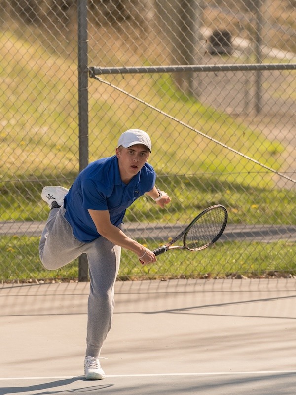 Reed Newell Playing Tennis